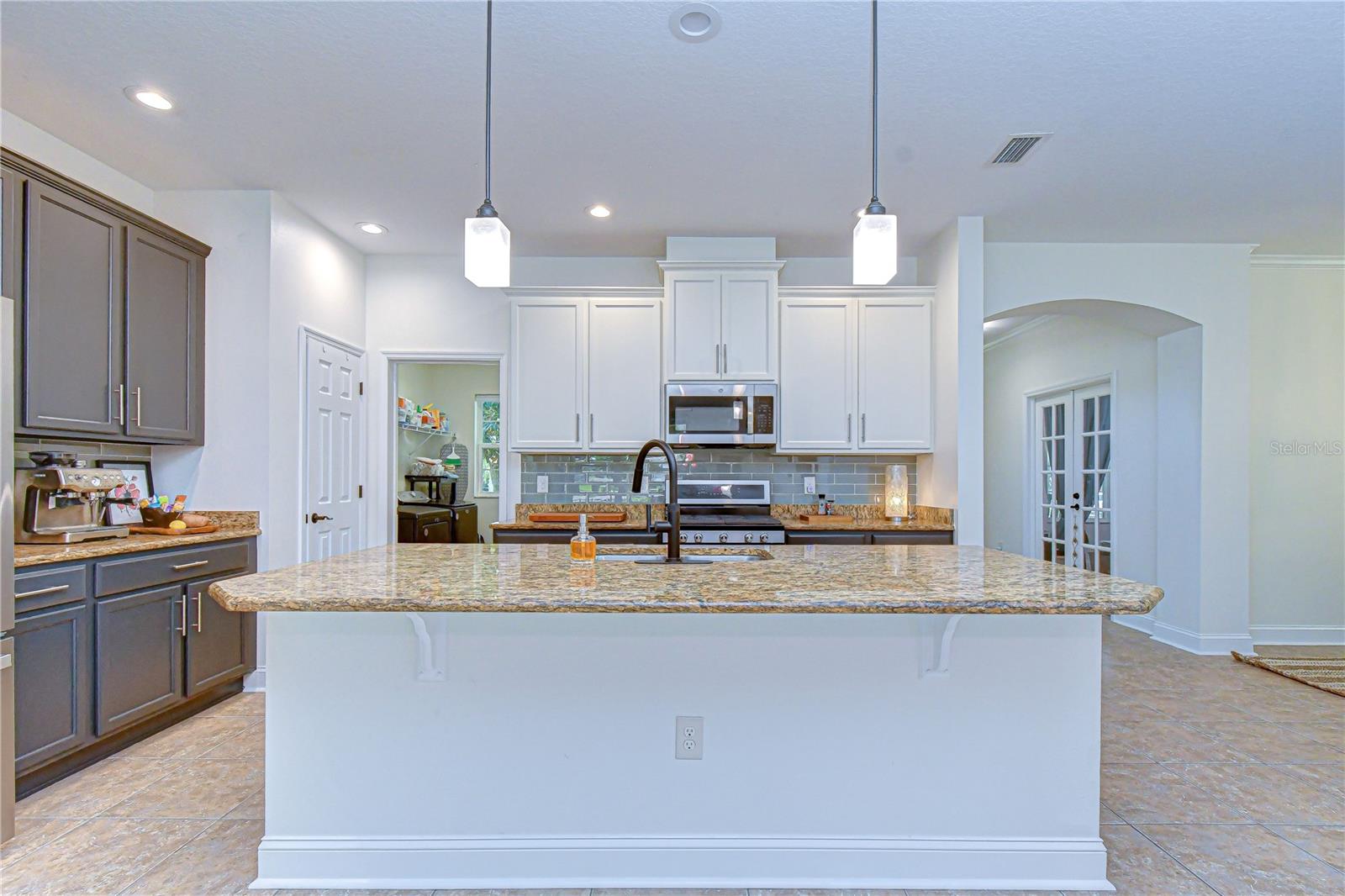 Beautifully remodeled kitchen — the heart of this home
