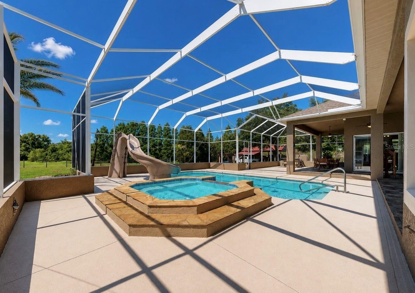 Custom pool and spa with slide