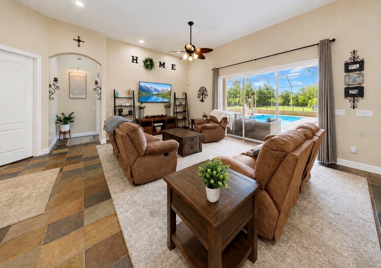 Great room with sliders to pool
