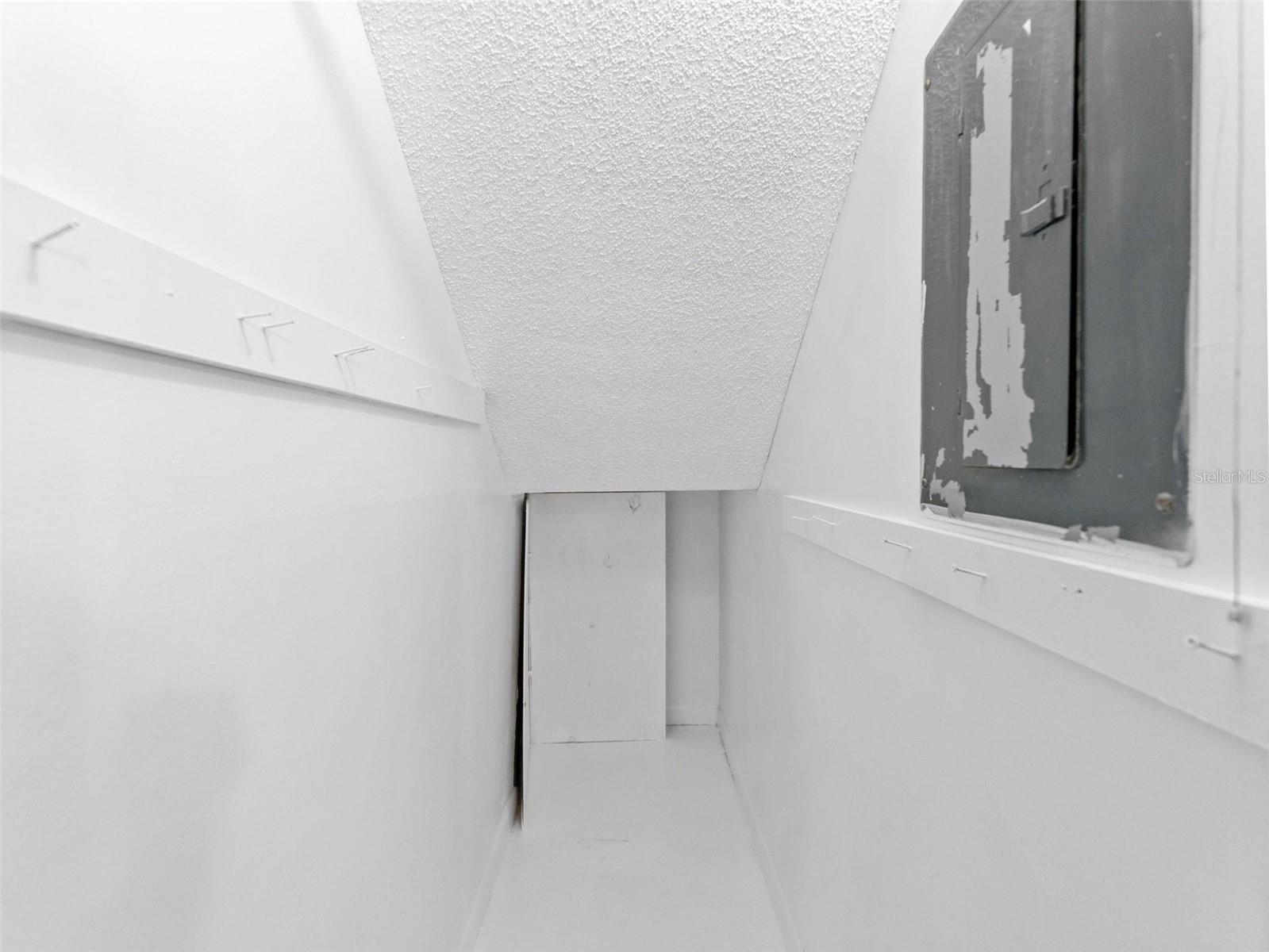 Closet under stairs