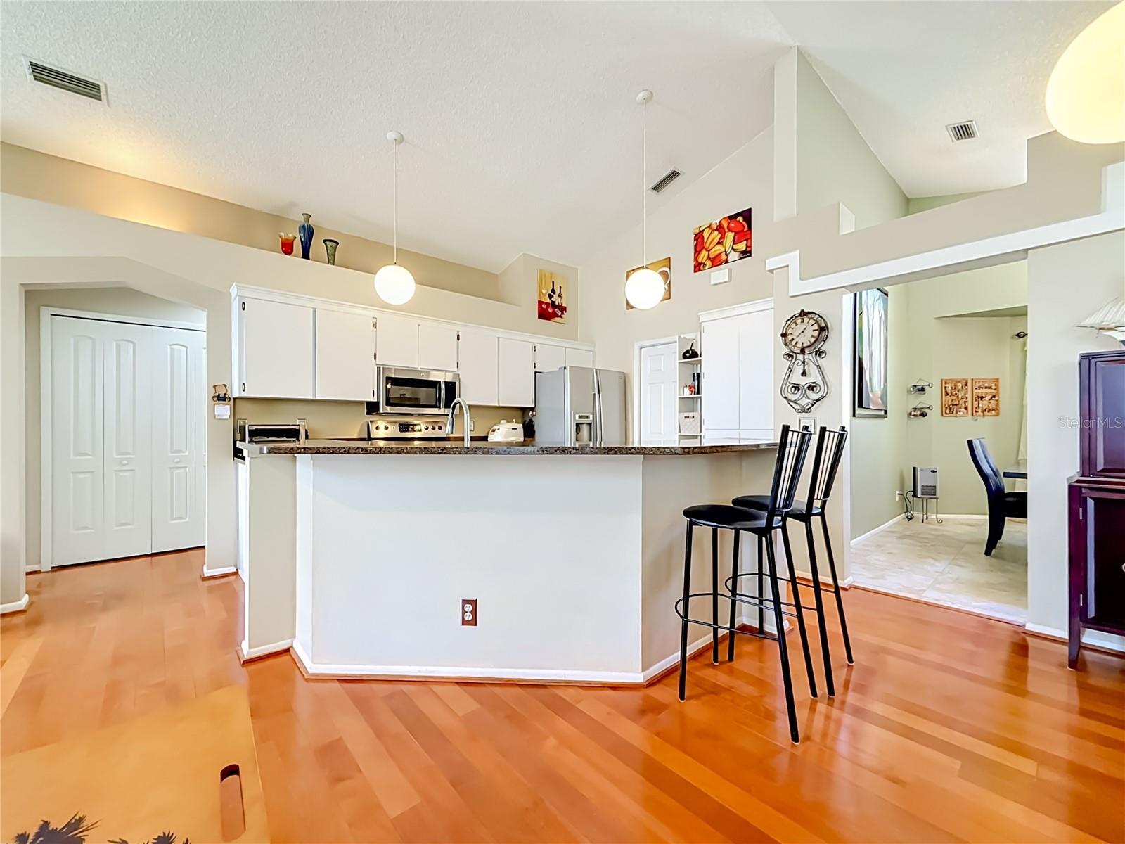 Solid hardwood floors in Family Room Area and hallway to Bedrooms 2 and 3. No carpet in Living Areas!