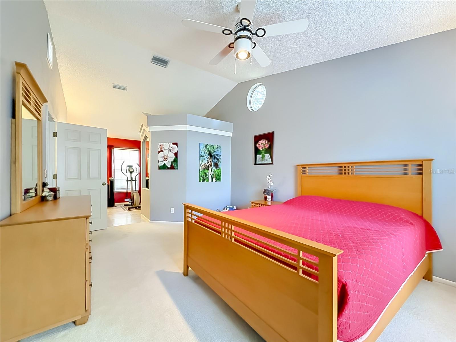 Convenient Walk-in closet off primary bedroom and primary bathroom.