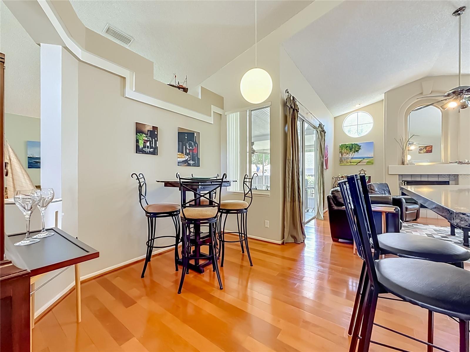 Family room has hardwood floors! Ceiling Fan! High Ceilings!