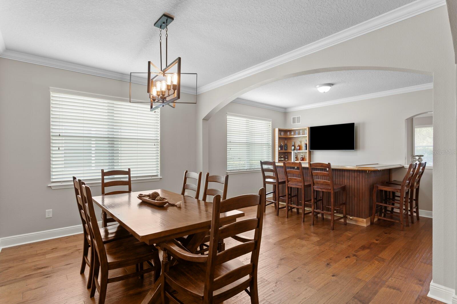 Formal dining room looking into the living room