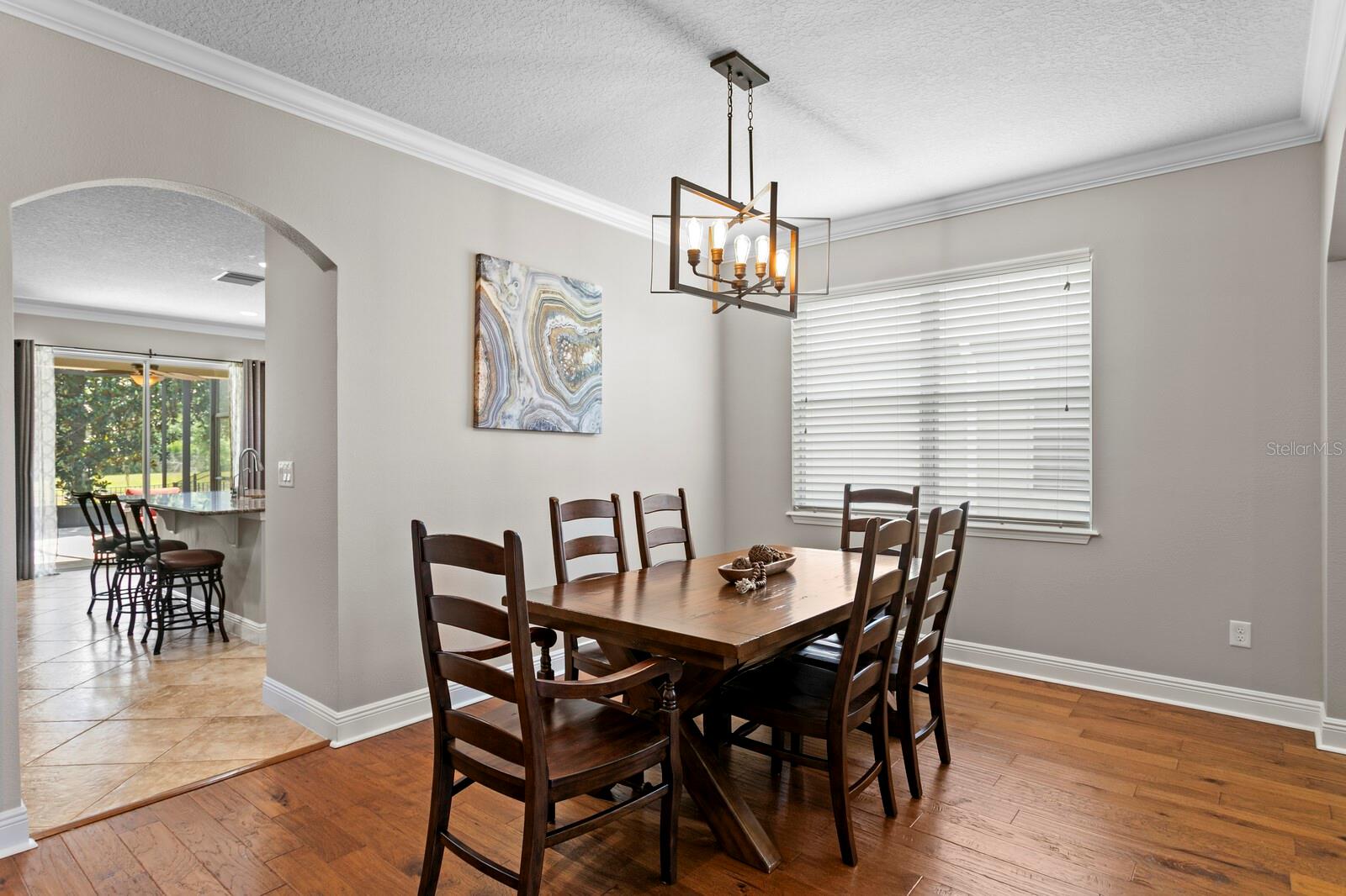 Formal dining room looking into kitchen