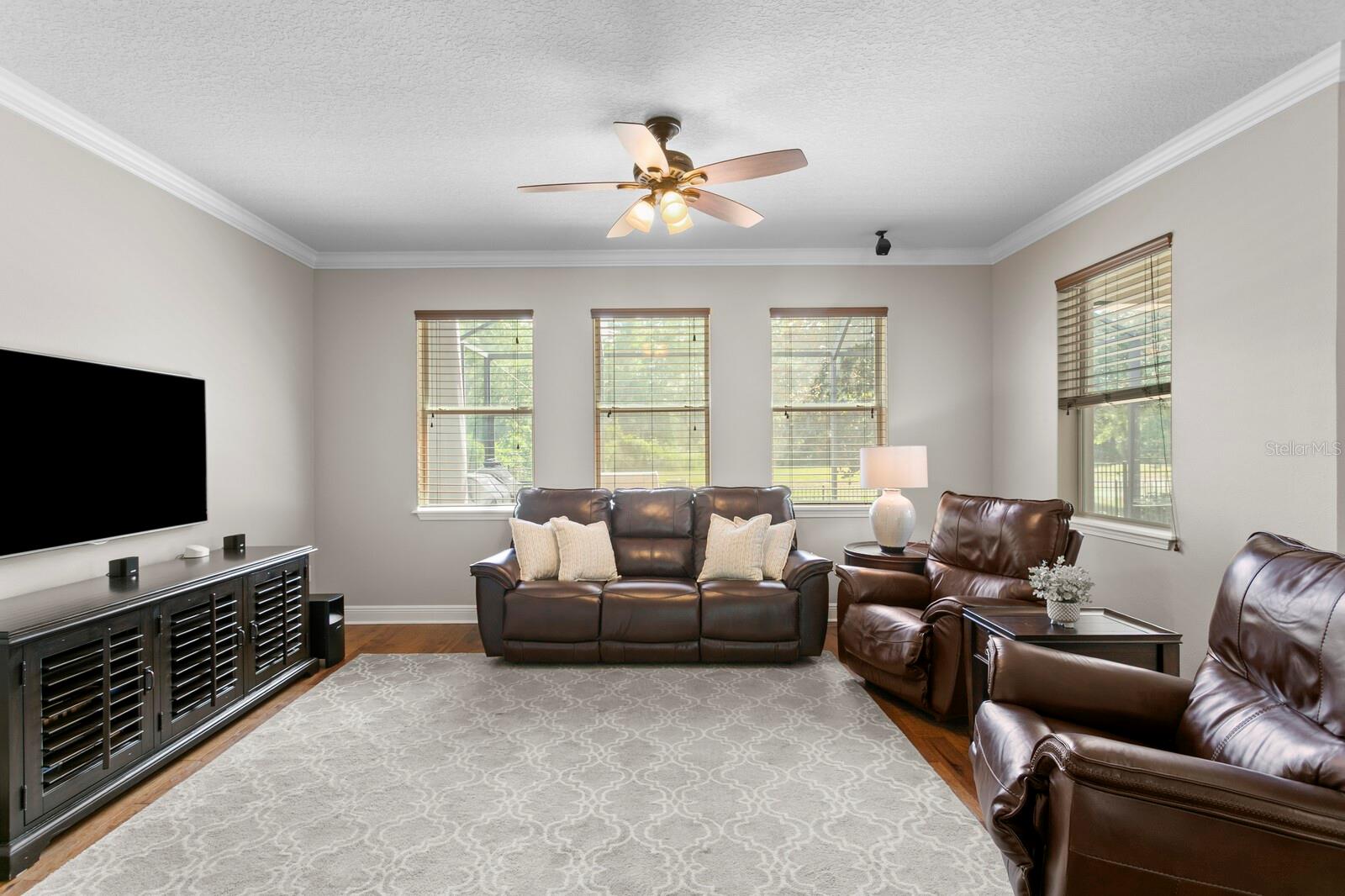 Large family room with backyard views