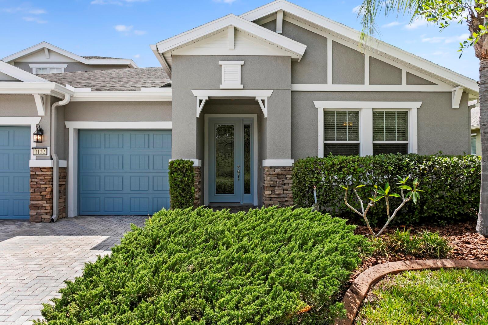 Mature landscaping & curbing