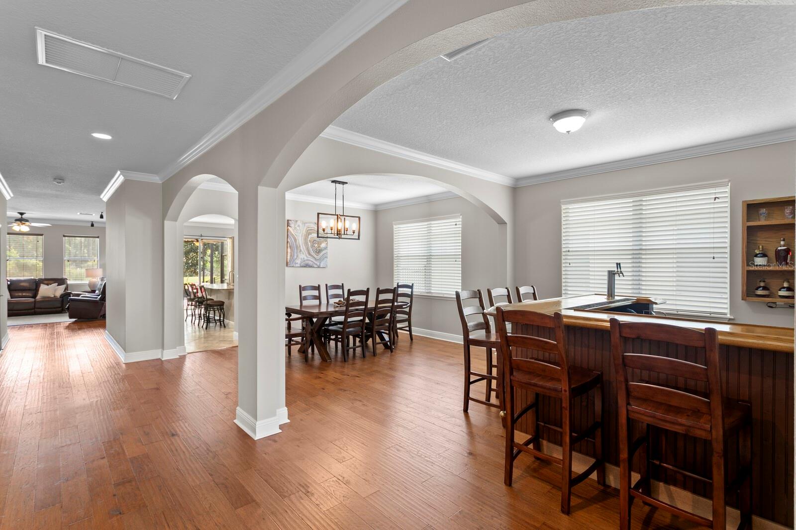 Foyer into formal living and dining rooms