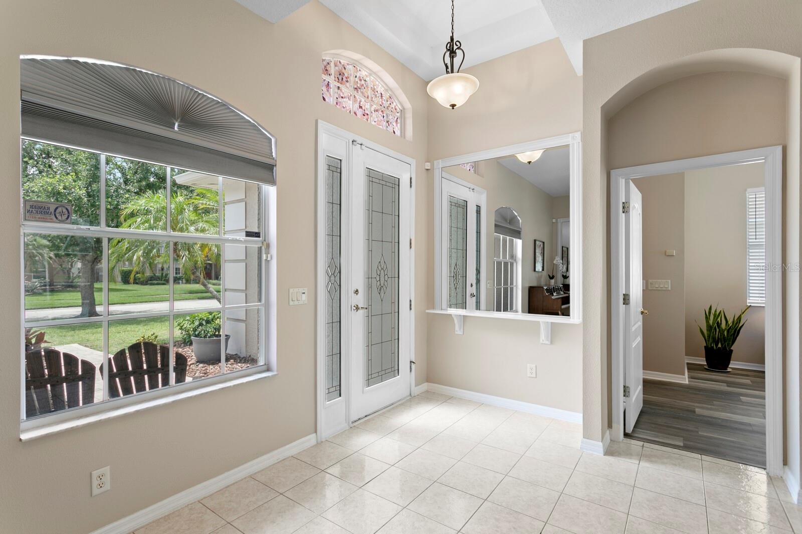 3-way split bedroom layout with primary suite off the foyer