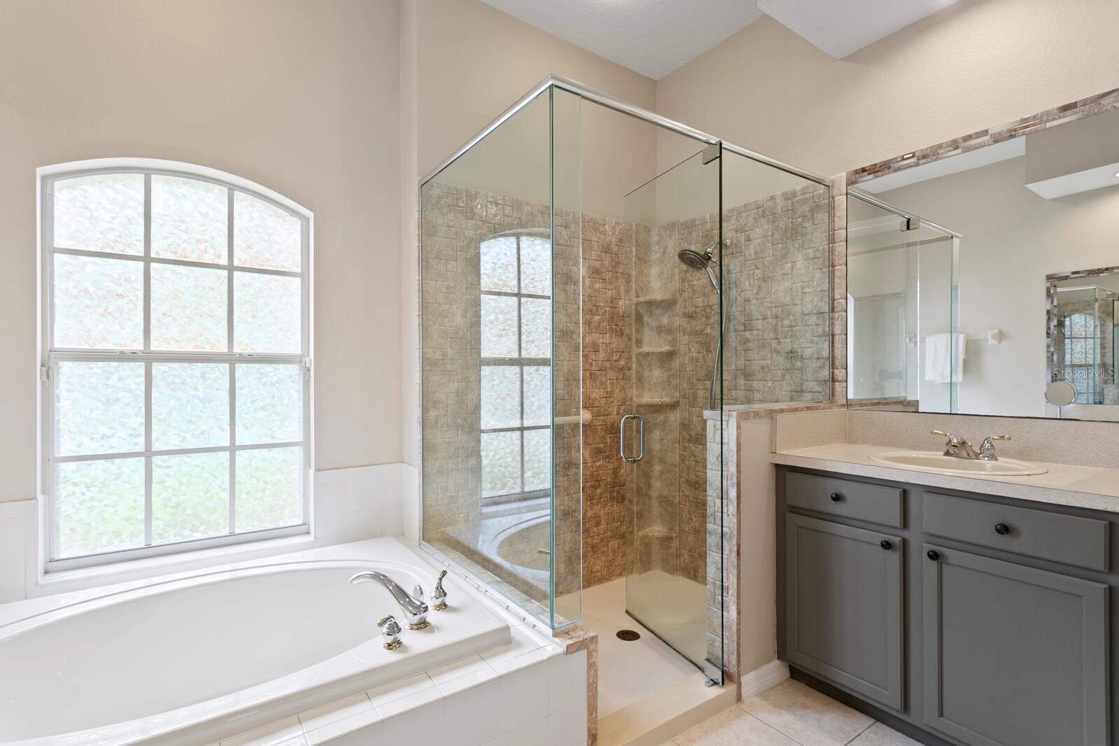 Spacious primary bathroom with