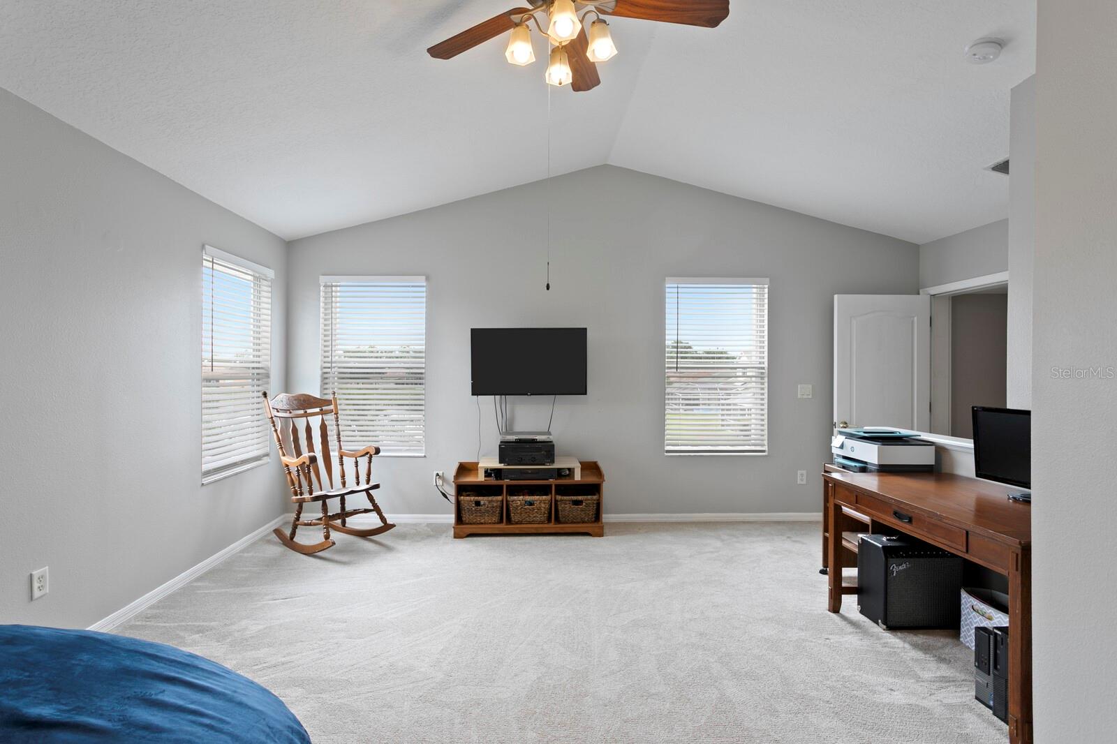 2nd floor bonus room with vaulted ceilings and water views