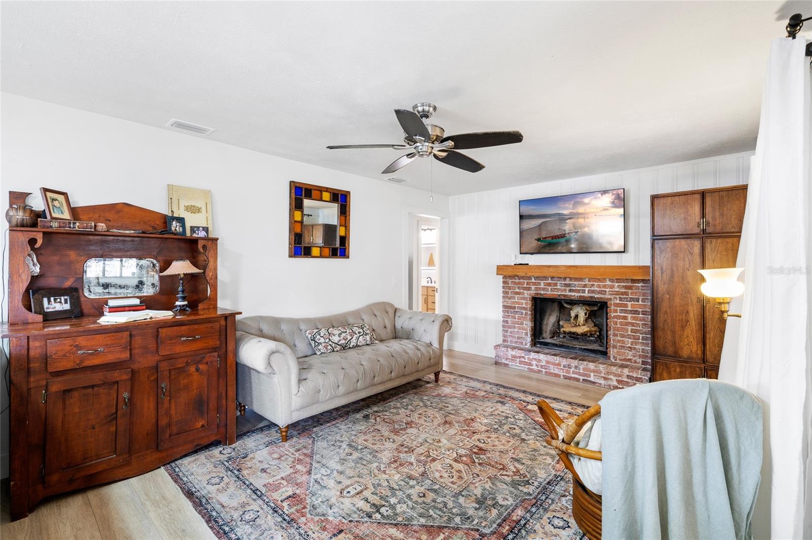 Family Room With Wood Burning Fireplace