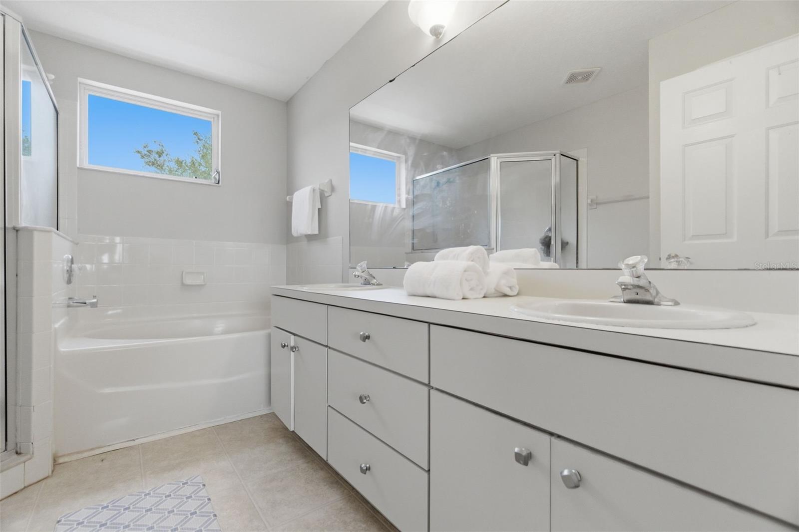 Master bathroom ensuite. Double Sinks, soaking tub and stand up shower.