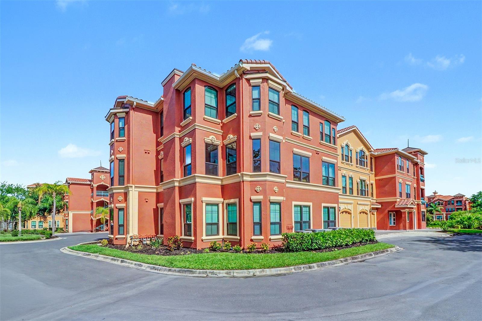Condominium on corner to the left and right
