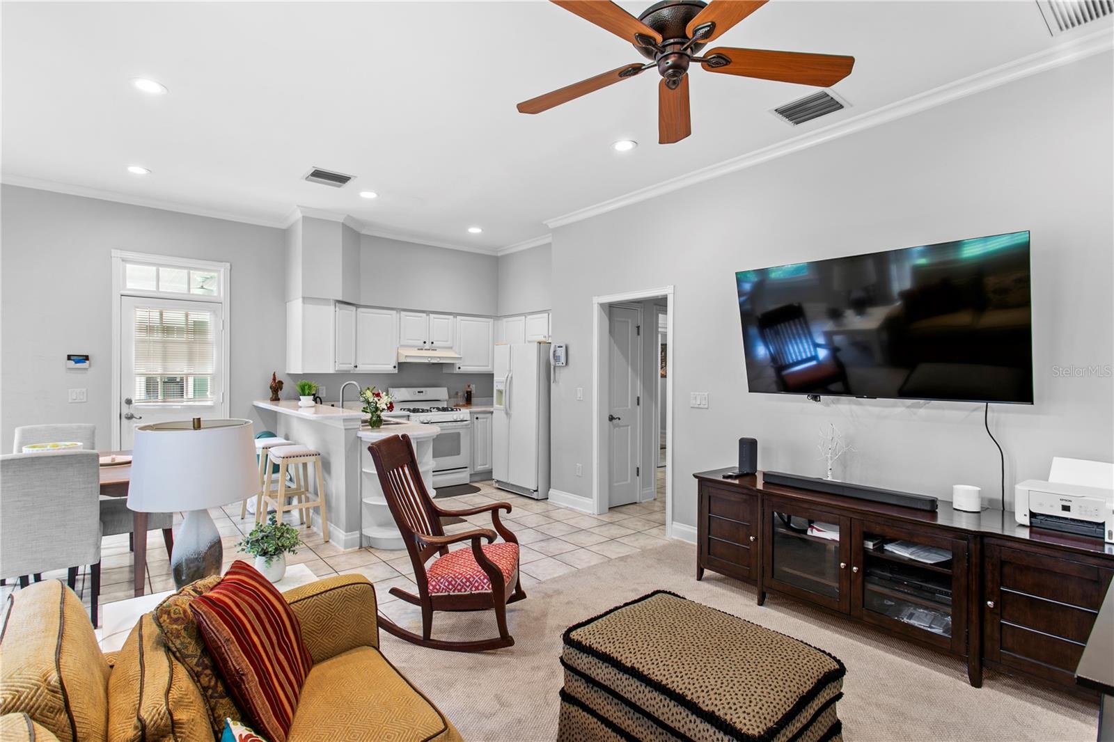 The mother-in-law suite with full kitchen, informal dining space and living room