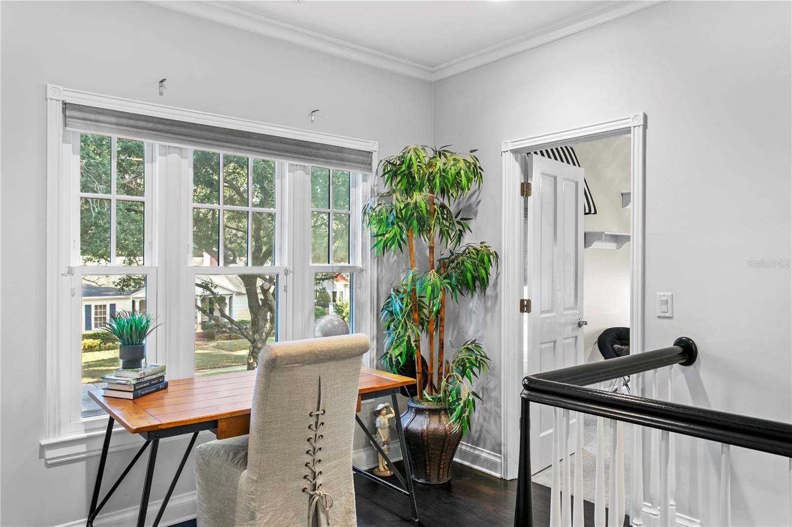 Utilize the upstairs landing as a functional desk space or cozy study nook.