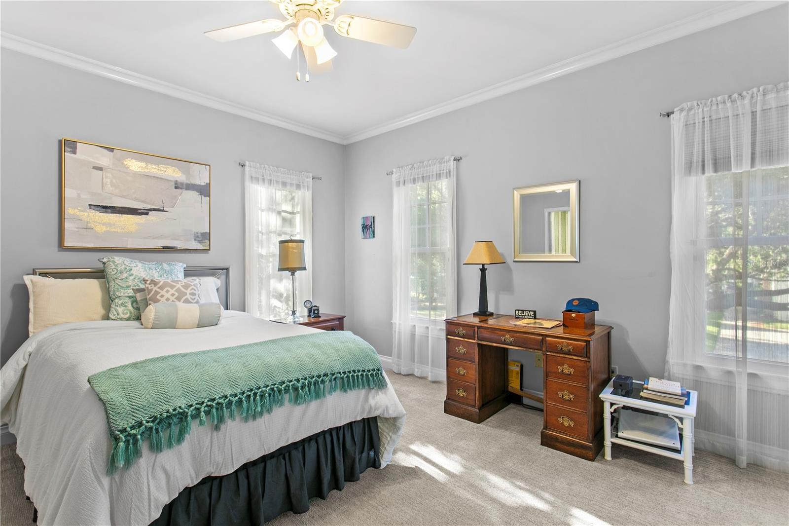 The third bedroom shares a Jack-and-Jill bathroom with it's own sink
