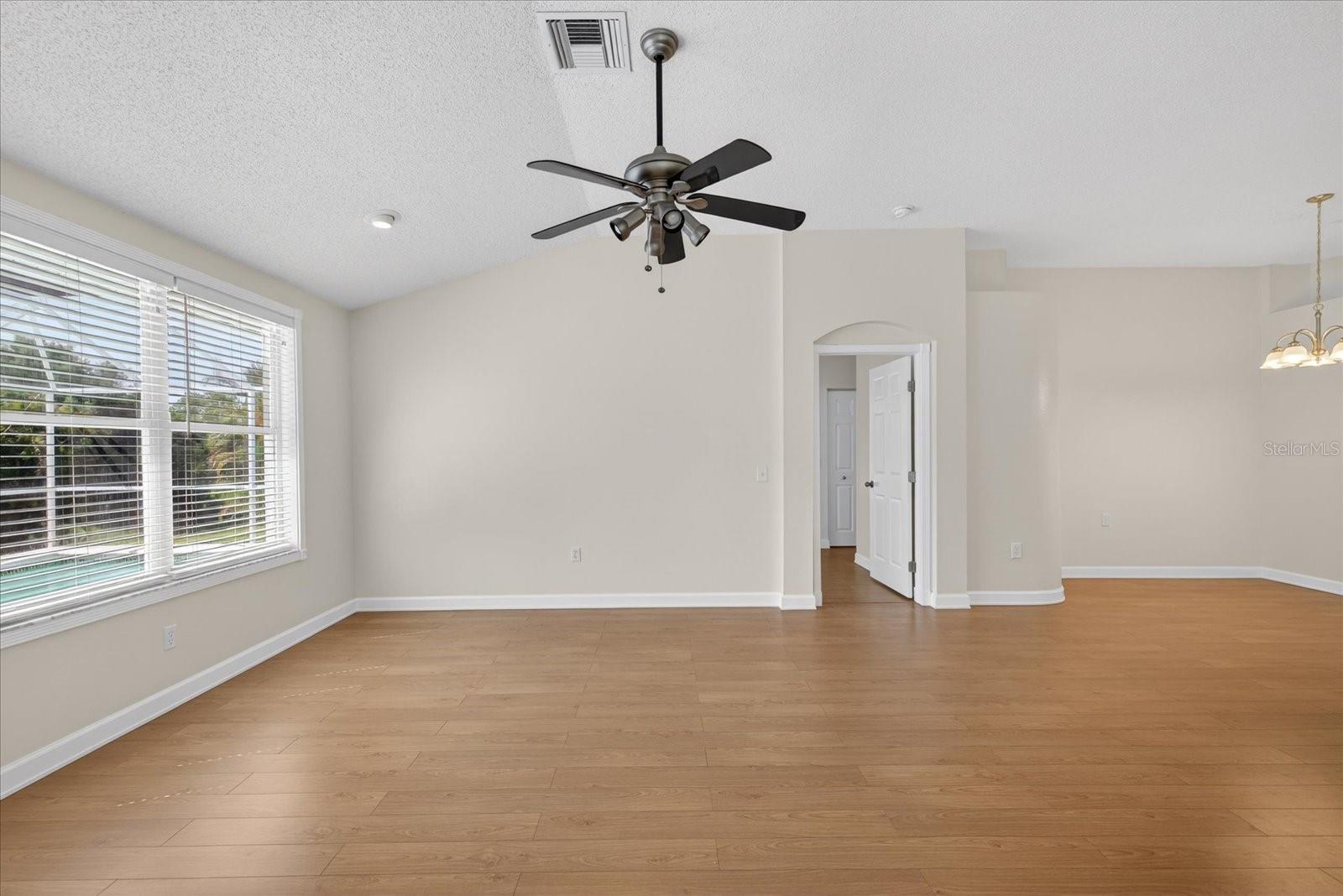 Living room facing door to master bed