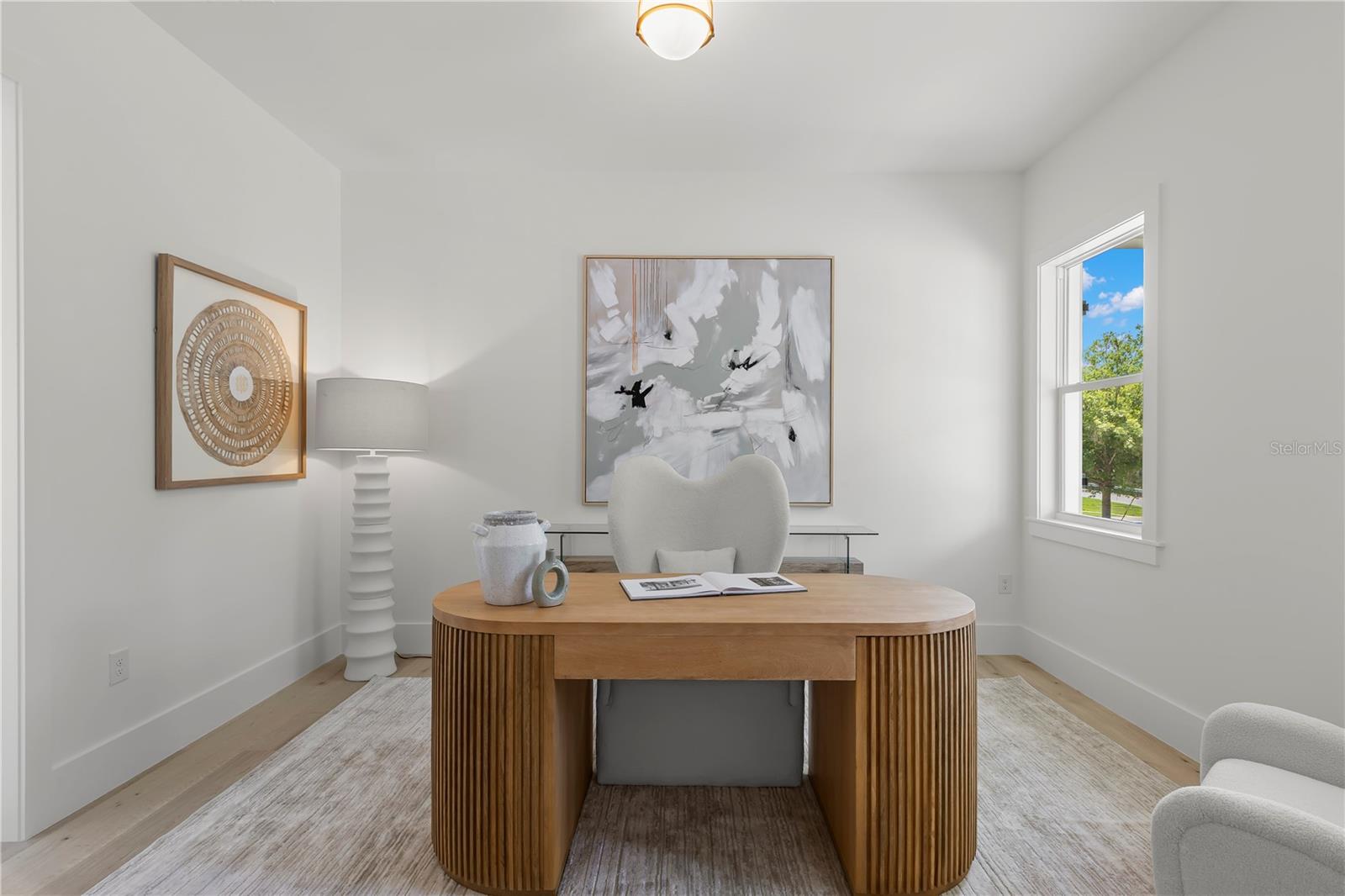 5th Bedroom-Main Level off foyer-staged as home office-en-suite bath and very large closet/storage