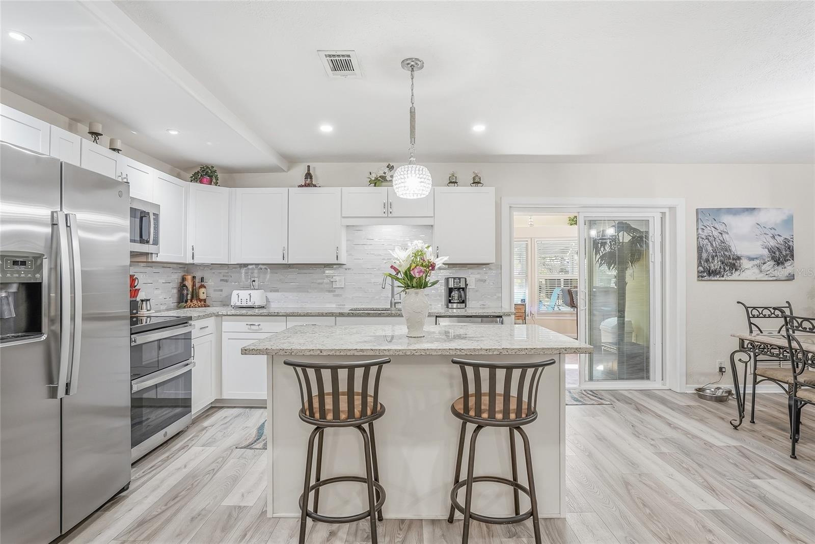Kitchen over looking the dining and sitting area