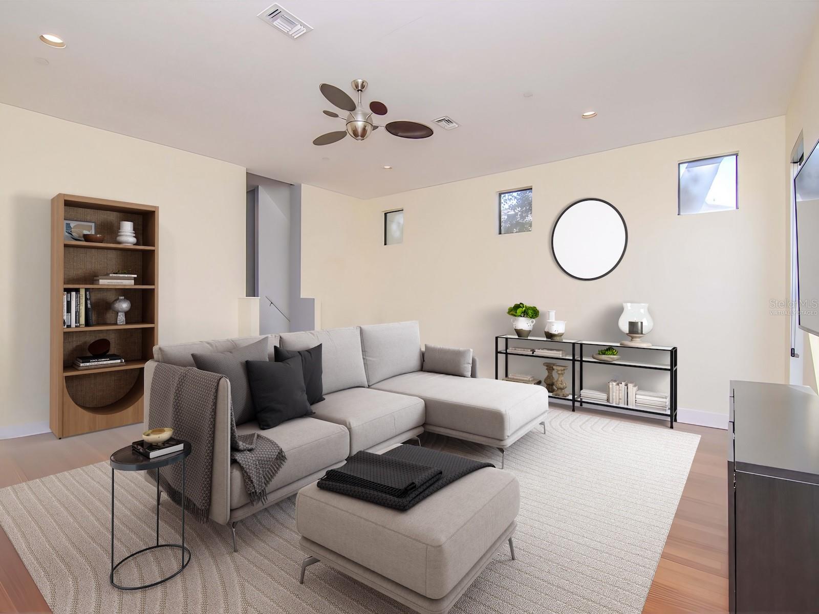 2nd level - Virtually staged expansive 20x20 family room offering exceptional flexibility for entertaining, movie nights, or comfortable everyday living.
