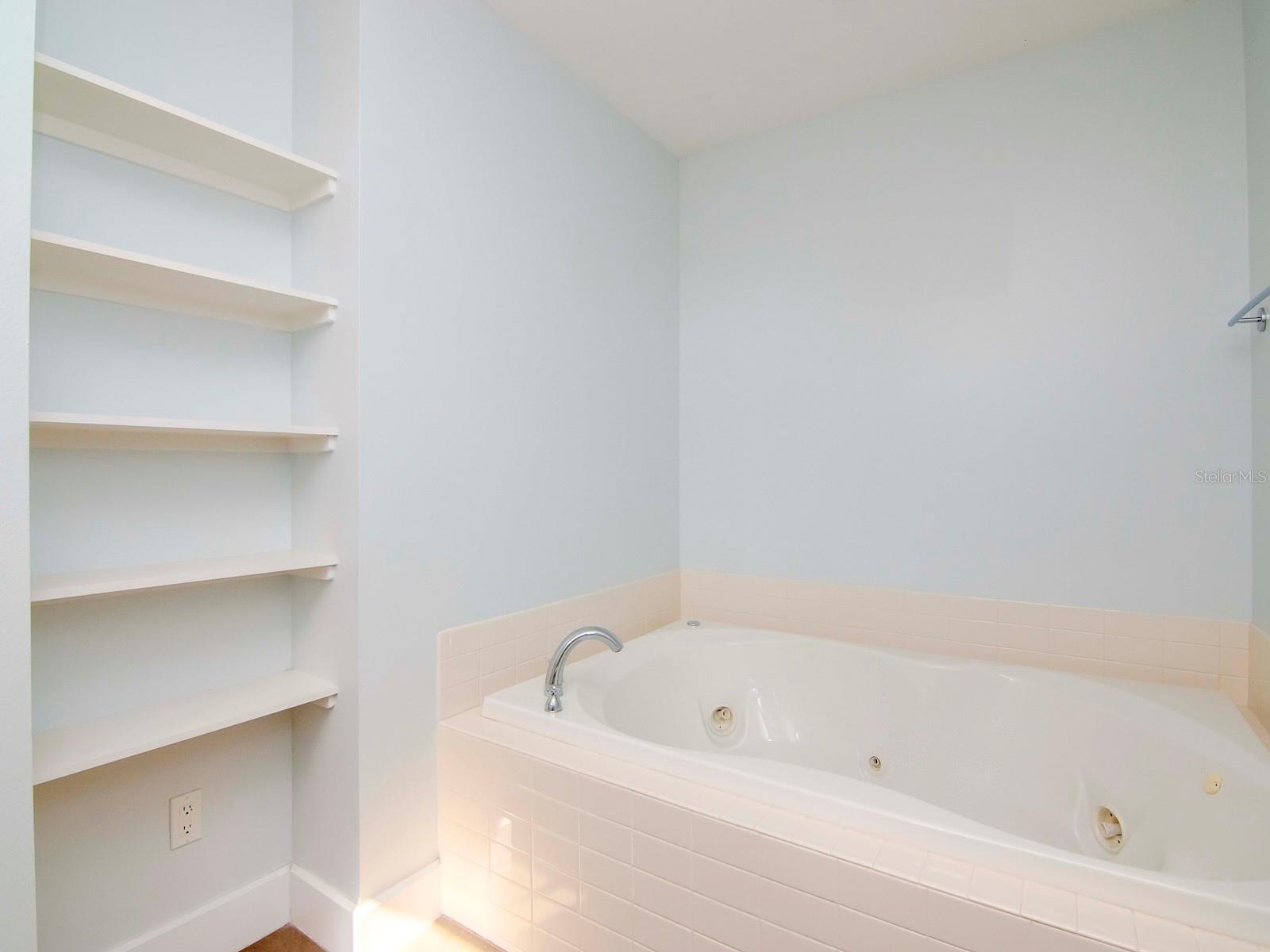 3rd level - Owners bath with soaking tub, dual vanities, and remodeled walk-in shower.