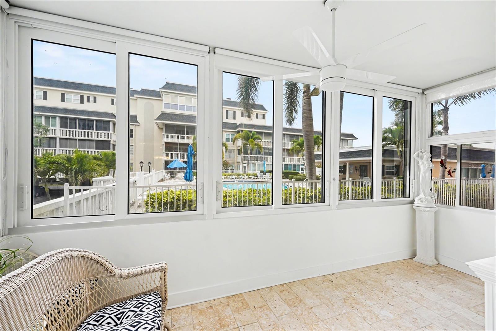 Patio exit door is adjacent to pool