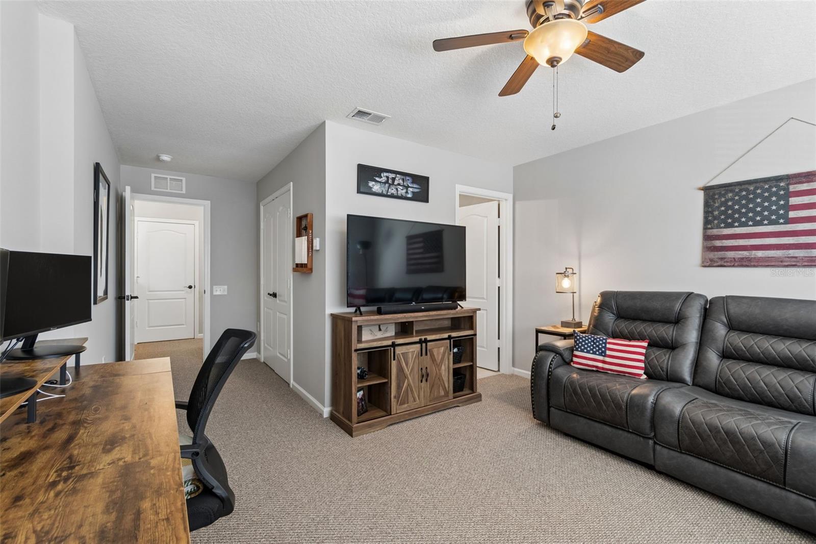 3rd bedroom being used as a bonus room/tv room