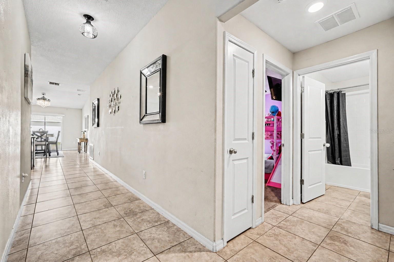 1733 Broad Winged Hawk Drive, Ruskin FL 33570 - Entry Hall/Hall to secondary bedrooms
