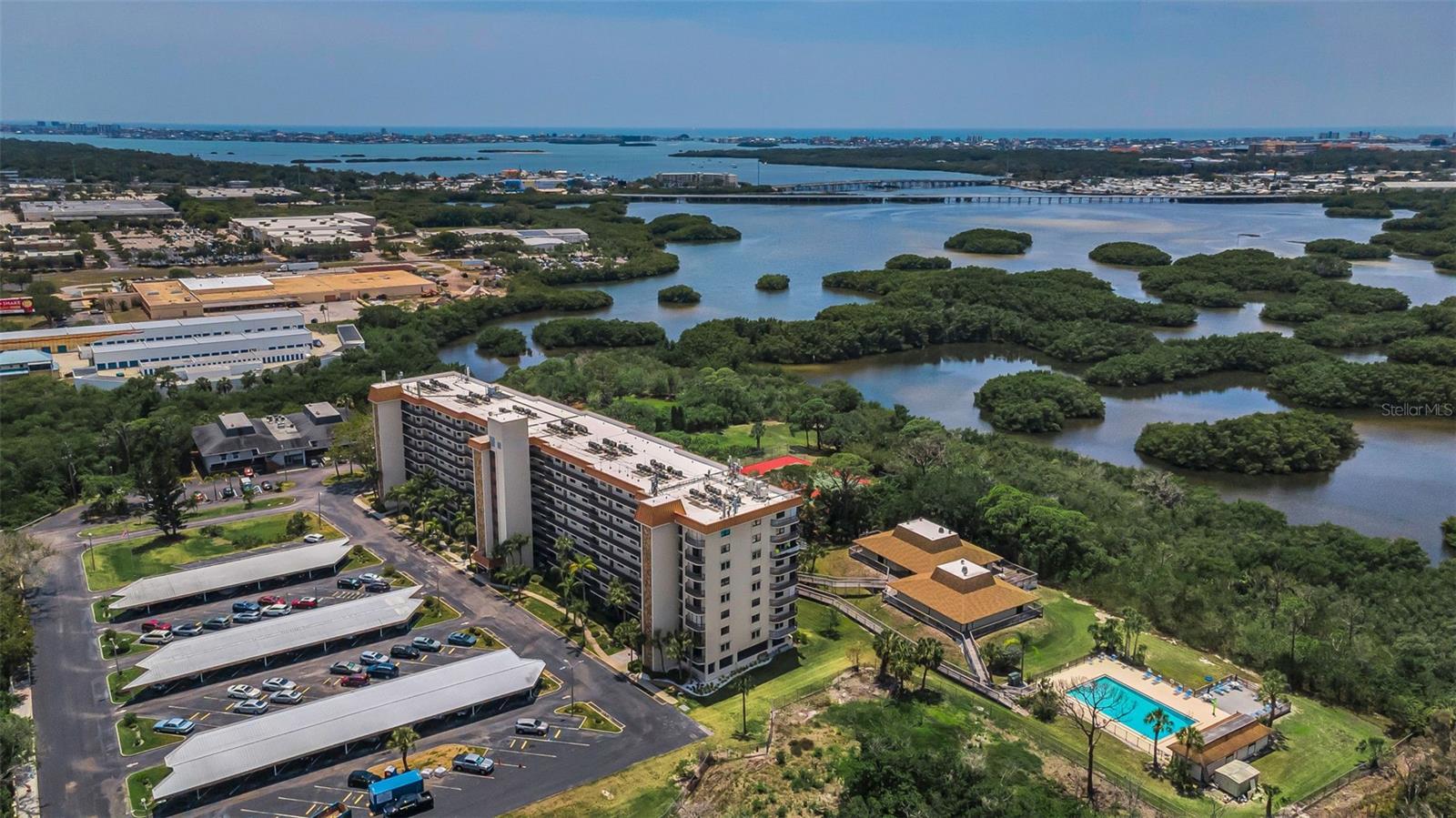 Close up view of Otter Key, the Association recreation areas, the huge heated pool, tennis & pickleball courts, Cross Bayou and Ocean waters beyond!