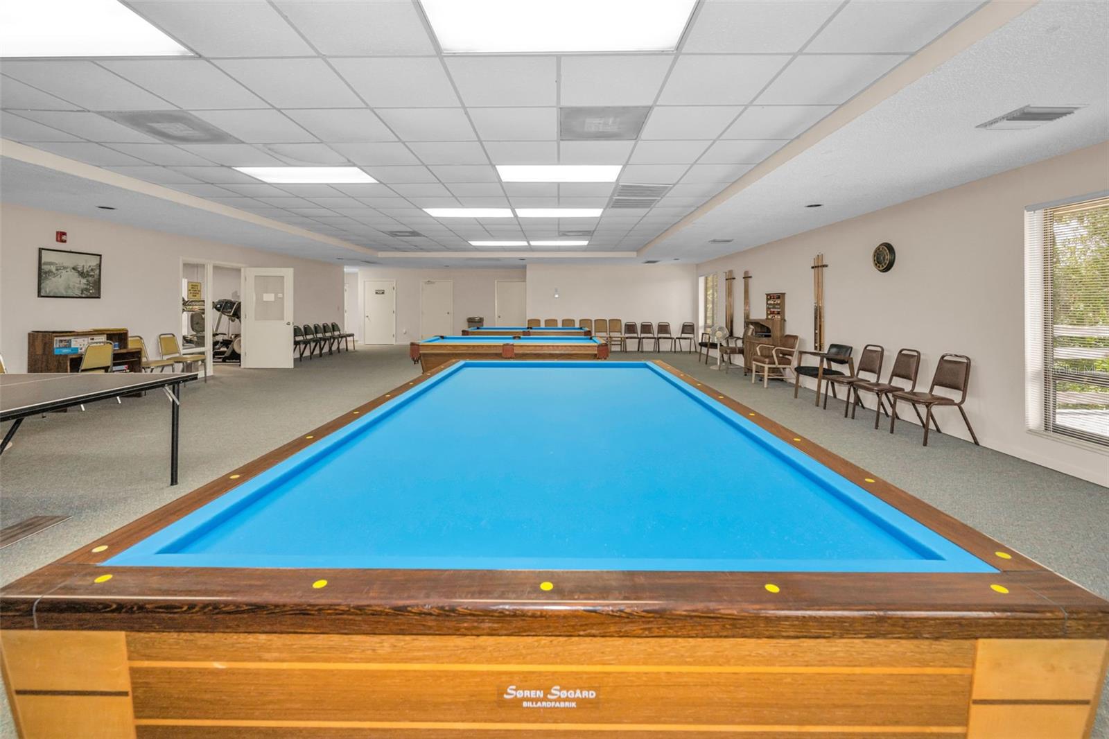 3 pool tables inside clubhouse!