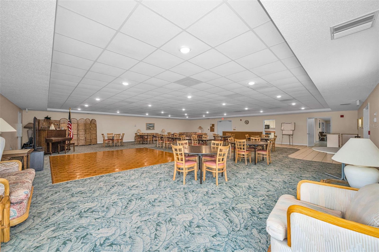 View of dance floor and card tables.