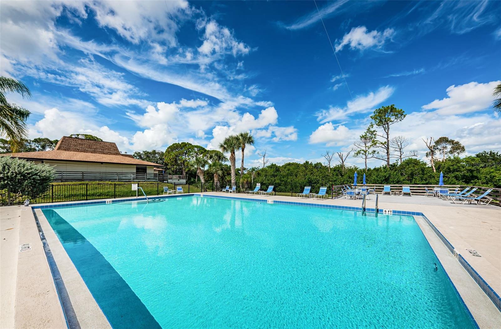 Heated pool with sun tan lounging area!