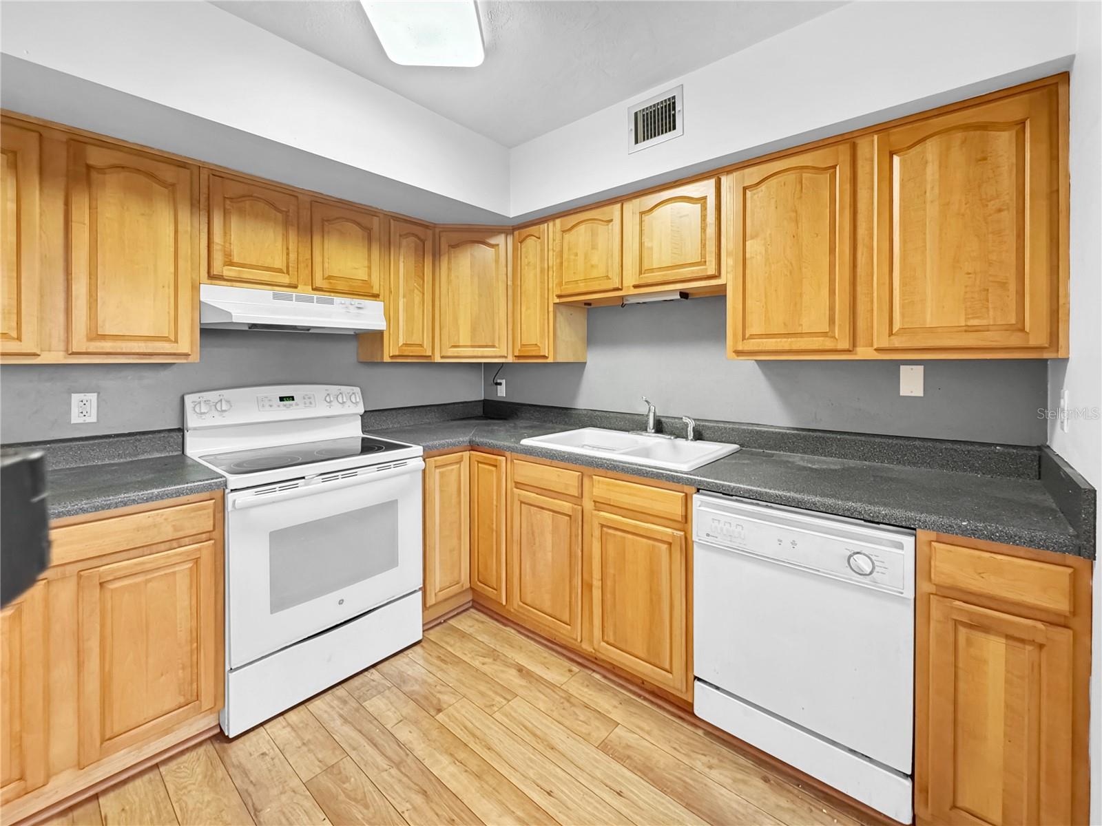 Kitchen with hardwood cabinets