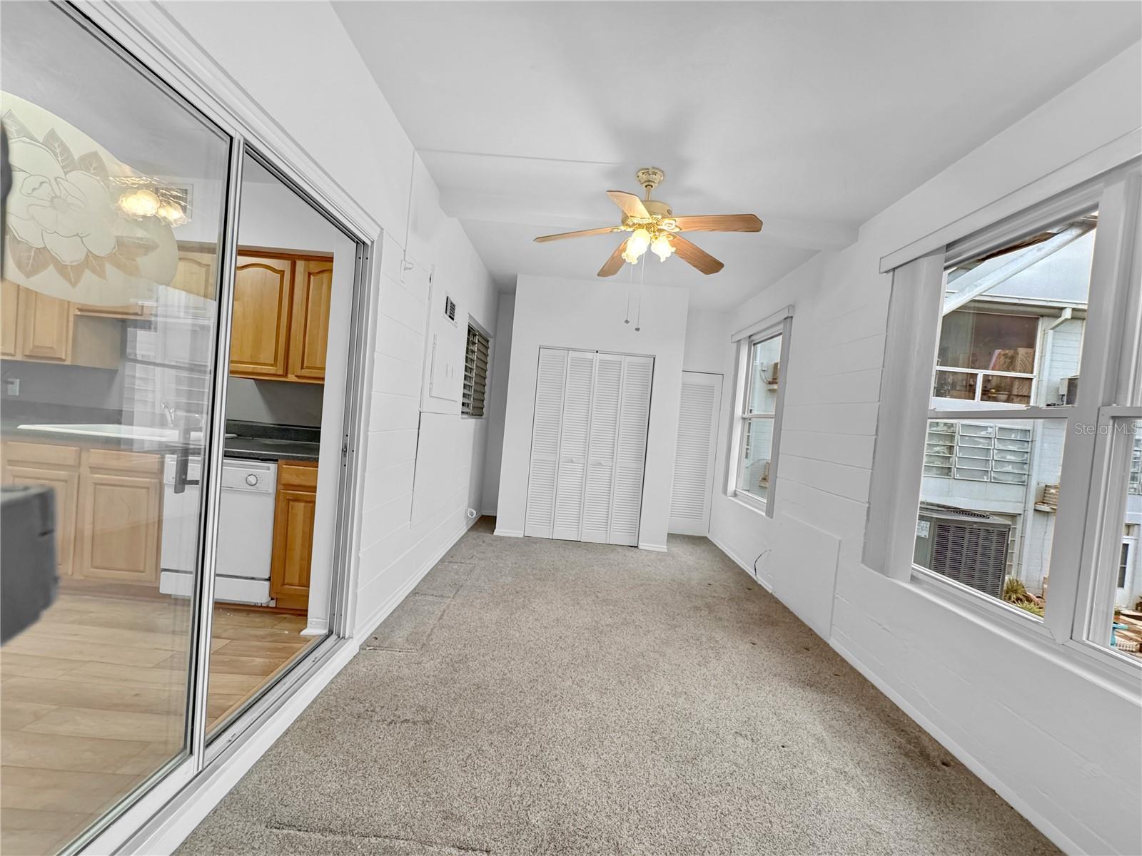 Great bonus room out of the kitchen with extra storage and great natural light.