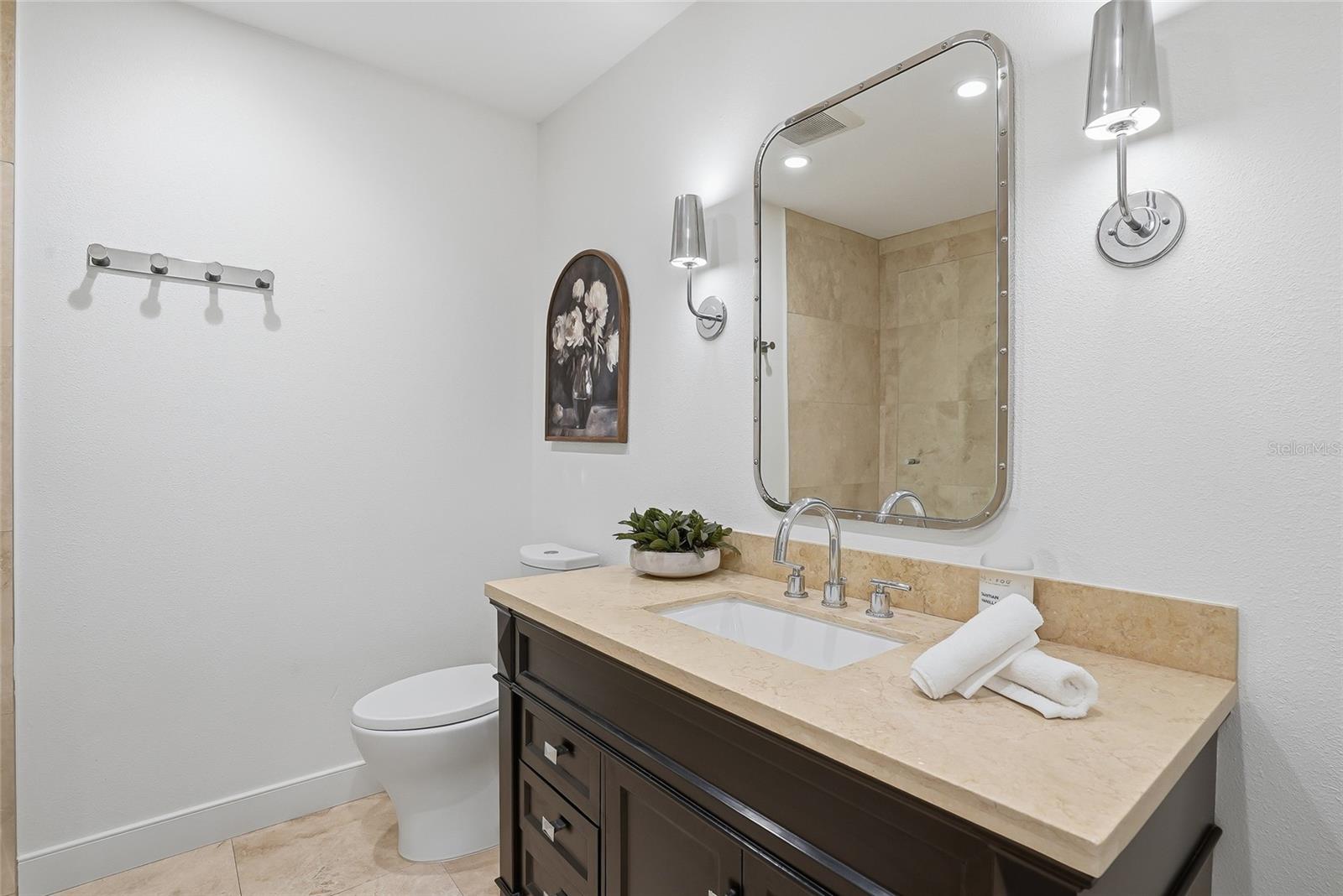 Updated guest bathroom with...