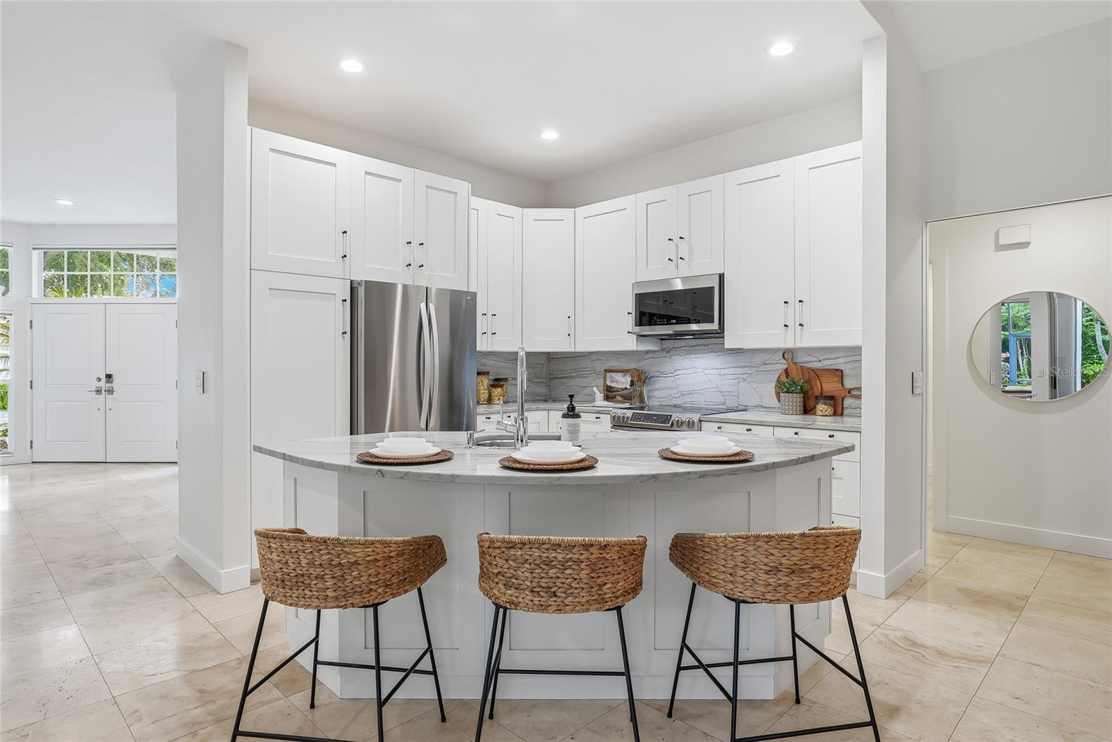 The breakfast bar is the hub of the kitchen.
