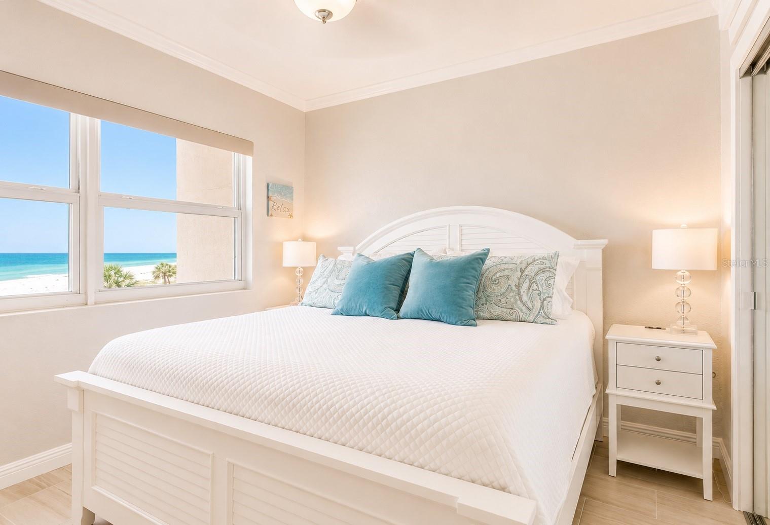 King sized bedroom with a view.