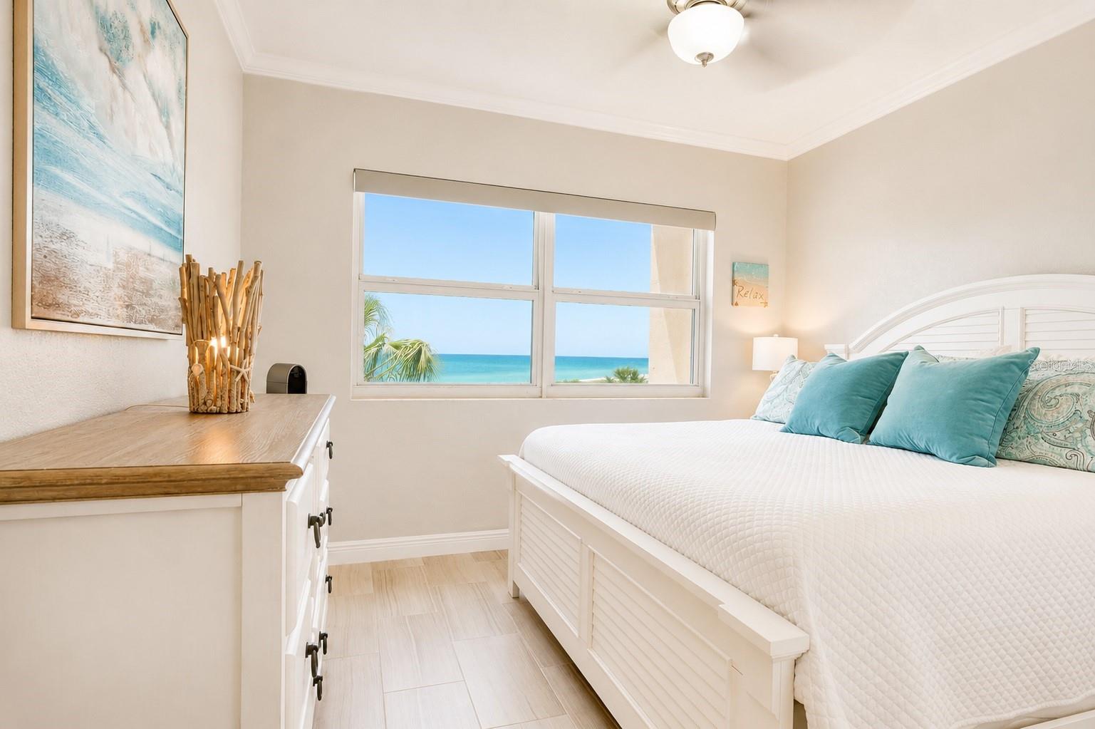 King sized bedroom with a view.