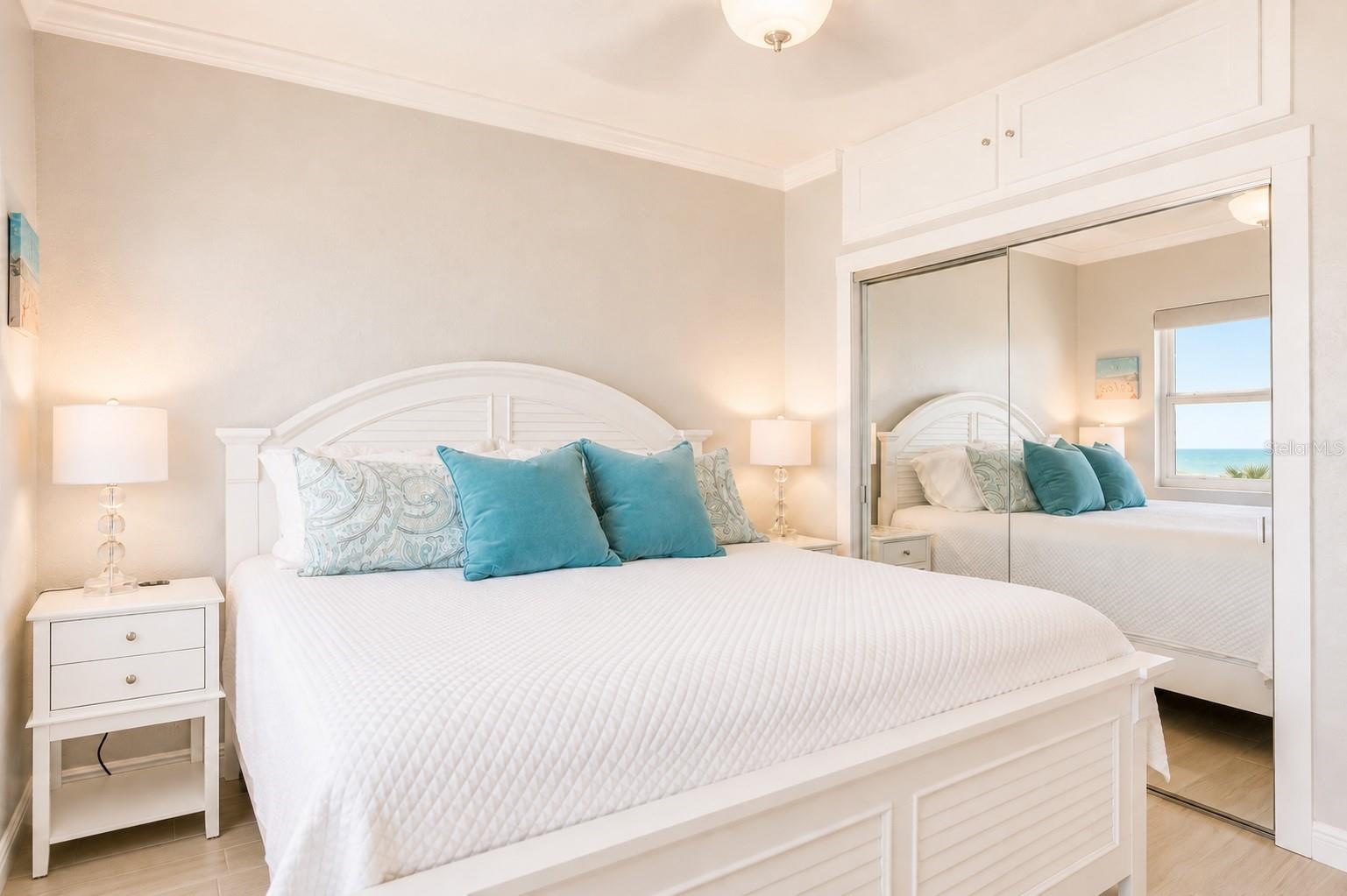 King sized bedroom with a view.