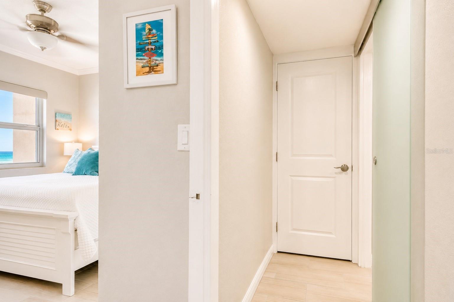 Bedroom and full-sized laundry.