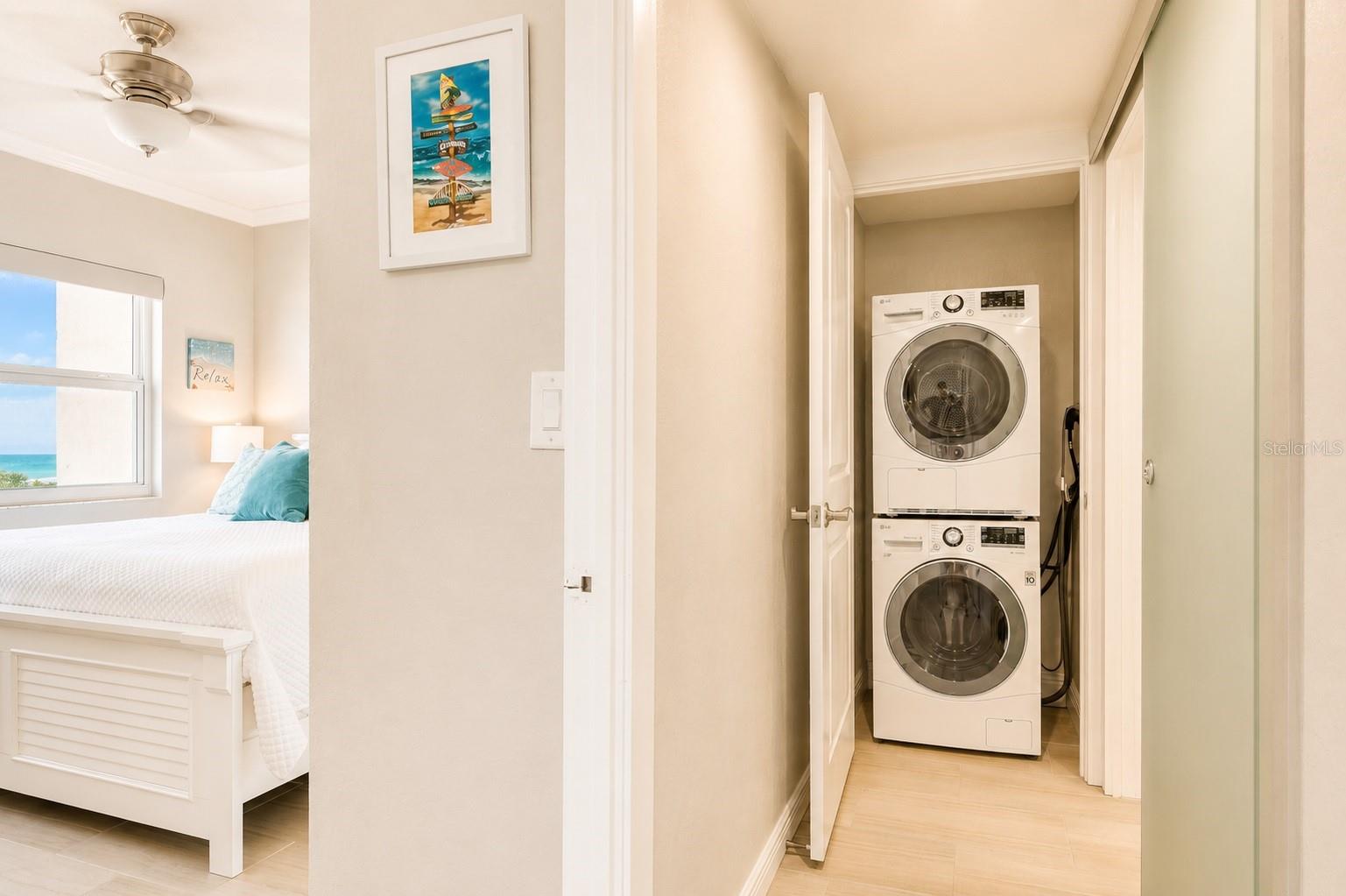 Bedroom and full-sized laundry.