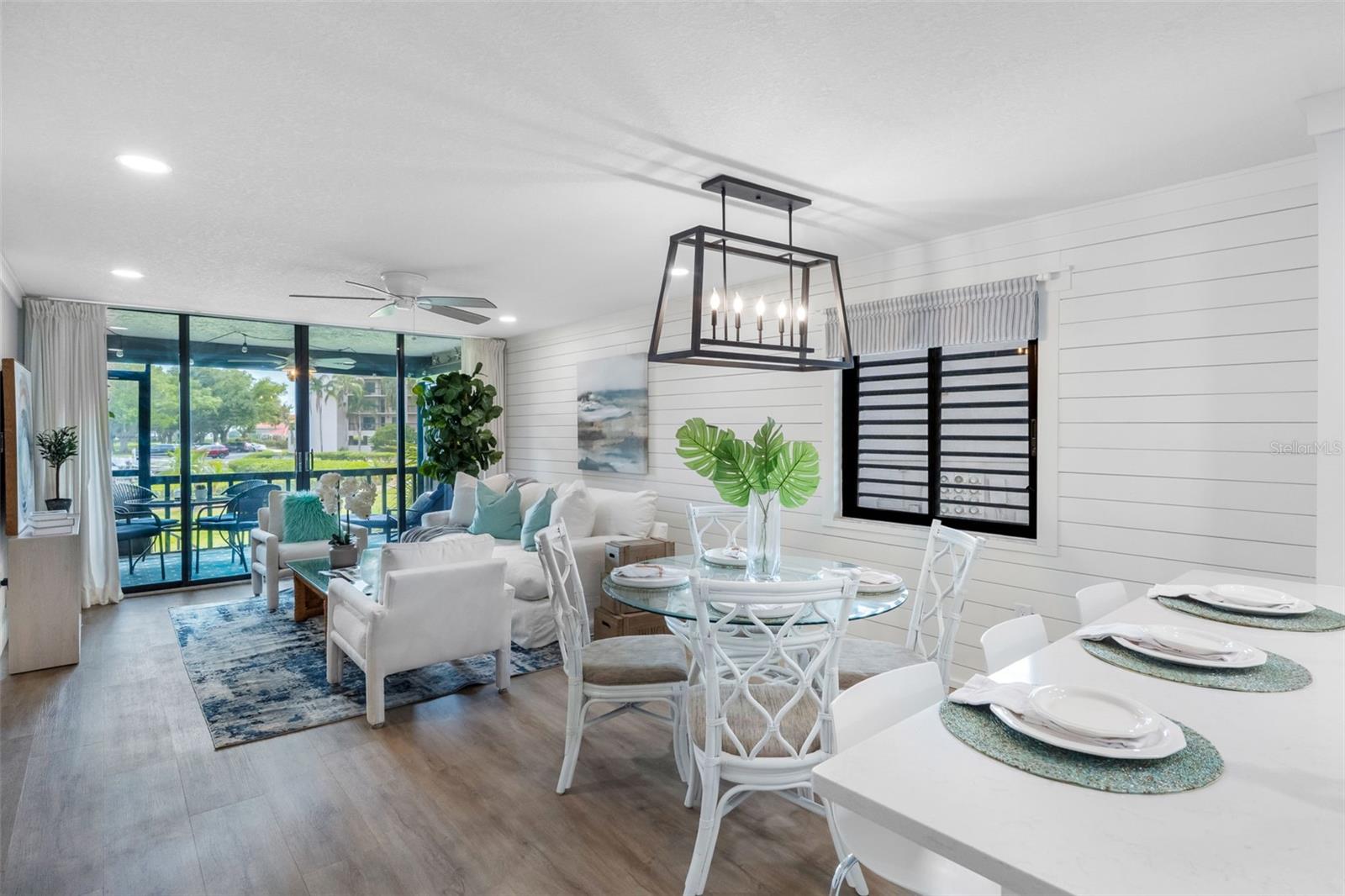 Coastal Open Floor Plan with Shiplap accent wall
