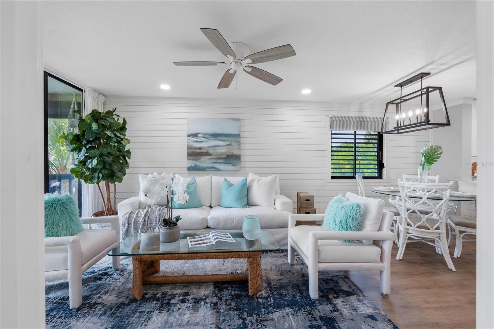 Open Floor Plan and Living Room with Shiplap Accent Wall and Coastal Decor
