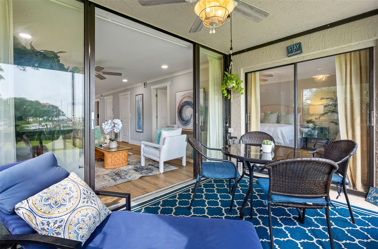 Covered Screened Patio has access from the living room and Primary.