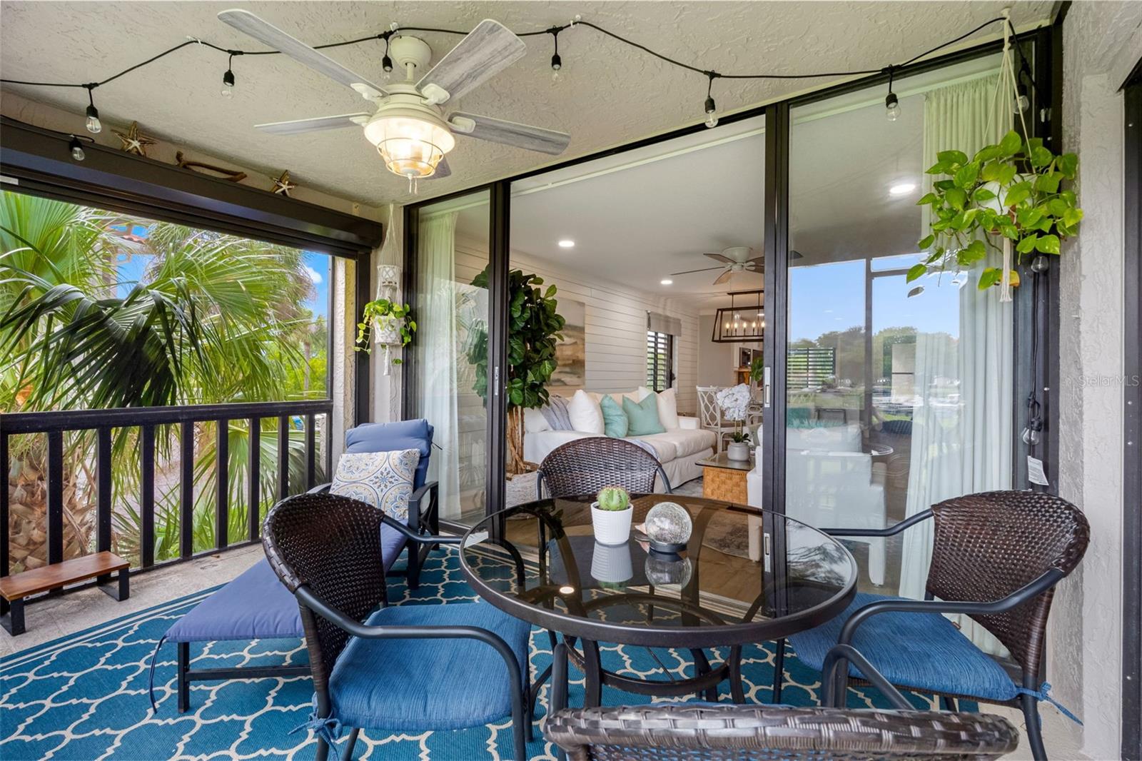 Private Covered Rear Patio with Hurricane Shutters and 8' Sliders
