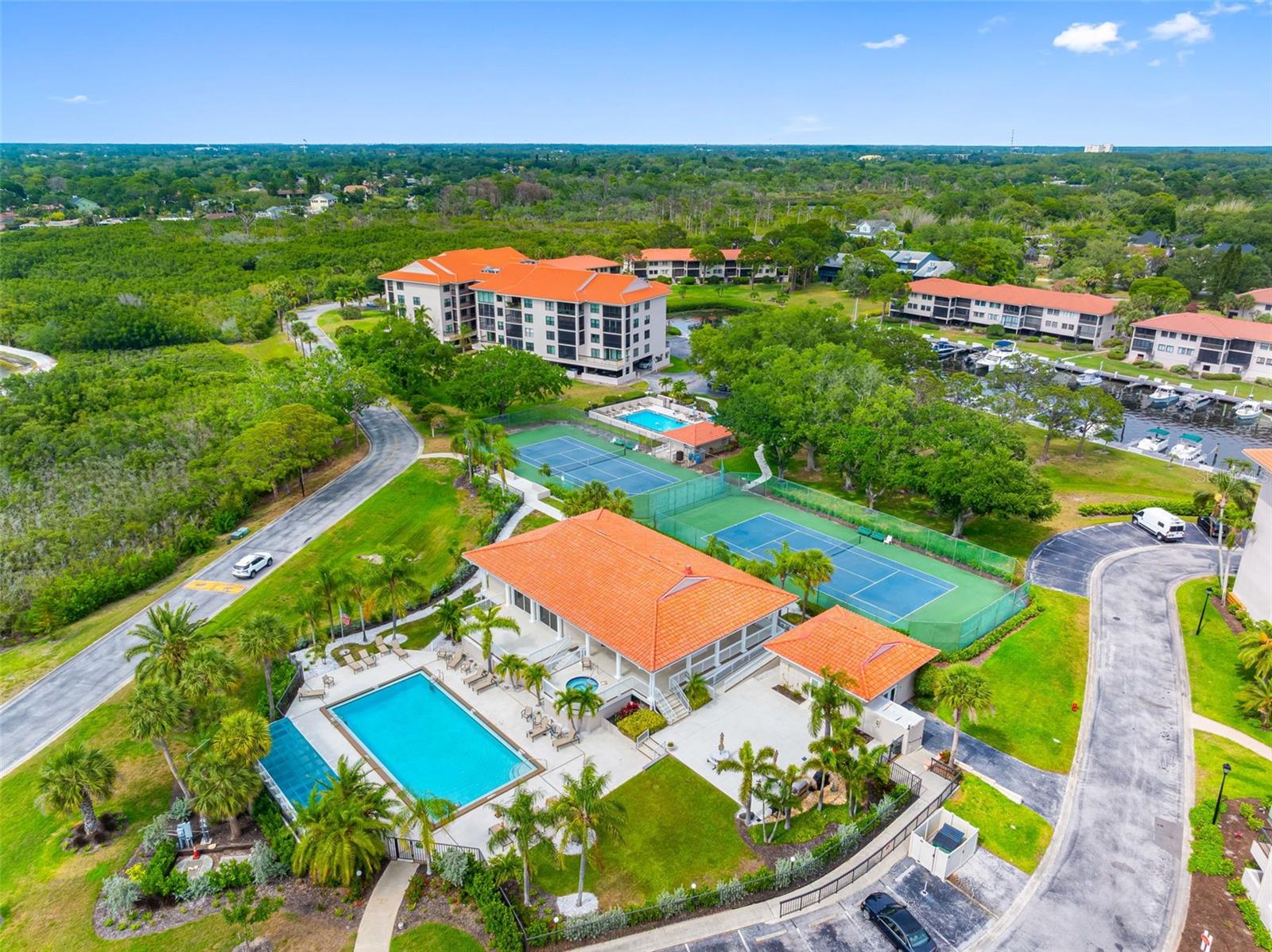 Clubhouse, Pool, Jacuzzi, Tennis and Pickleball Courts.
