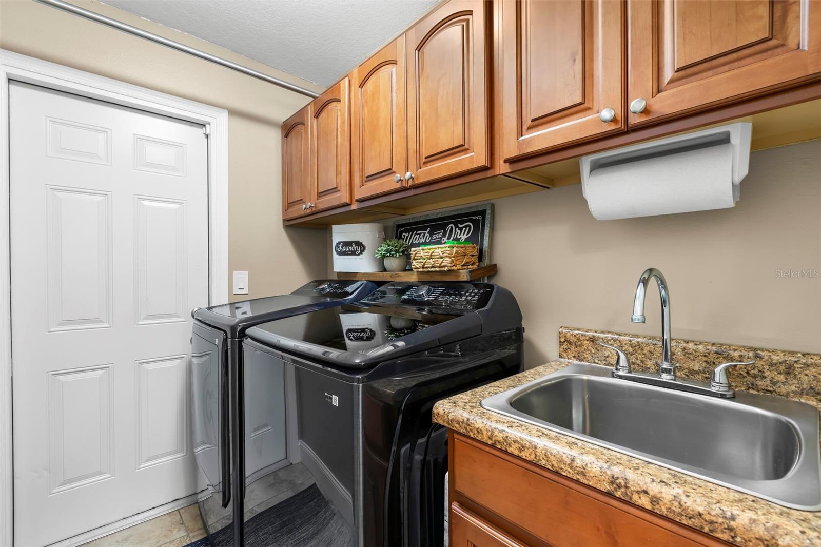 Laundry room with access to garage