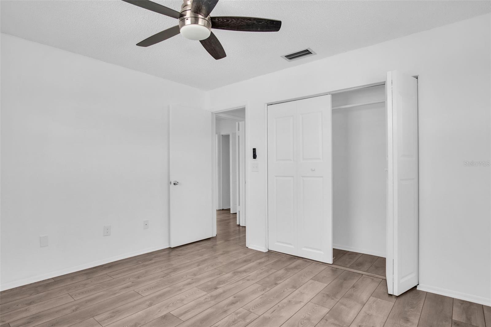 Second bedroom is equally as large with huge walk in closet ~