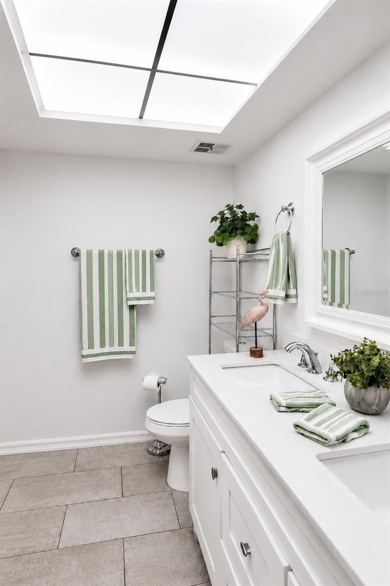What??? - the guest bath has double sinks! - Yes, all updated and with a walk-in shower ~